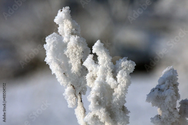Obraz A stack of pancakes on a track with smoke coming out of it