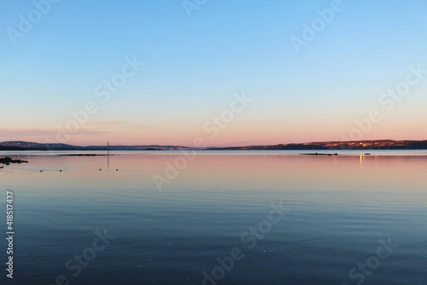 Obraz Beautiful rainbow reflects at golden hour