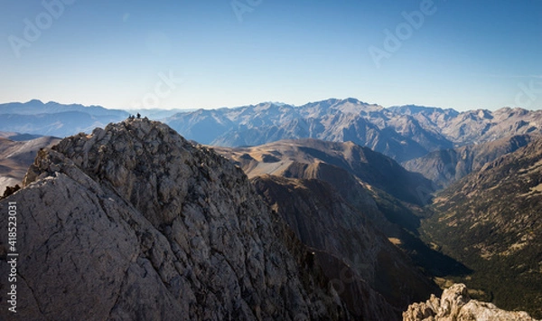 Obraz Climbers at the top of a mountain in the Pyrenees on a sunny summer day