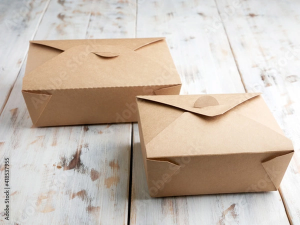 Obraz takeaway food ready to be distributed on paper boxes