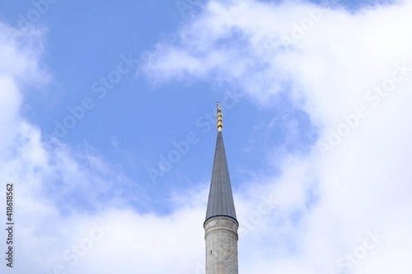 Fototapeta Turkey istanbul 03.03.2021. Blue mosque (sultanahmet camii) in istanbul and its minaret extends to cloudy sky.