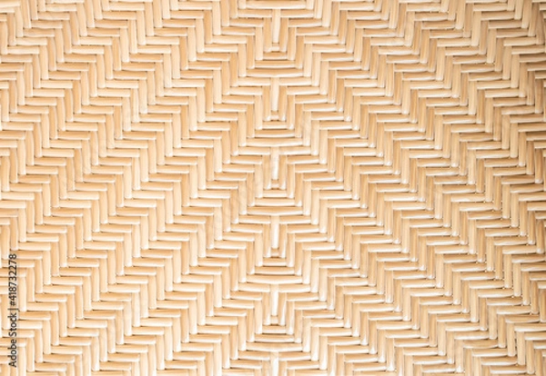 Fototapeta Bamboo or rattern weaving pattern texture background. A part of brown natural bamboo wood basket woven. Can use for decor, wallpaper and  design