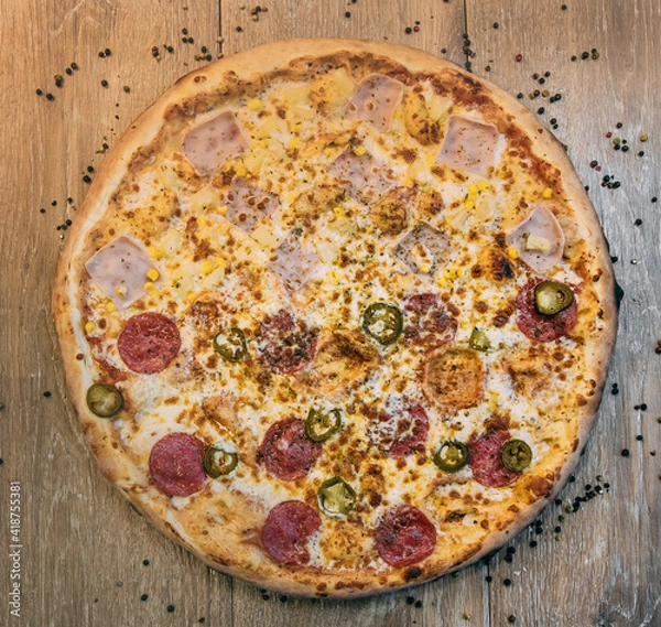 Fototapeta Double pizza with two different flavors