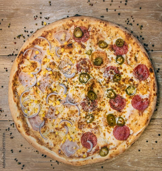 Fototapeta Double pizza with two different flavors