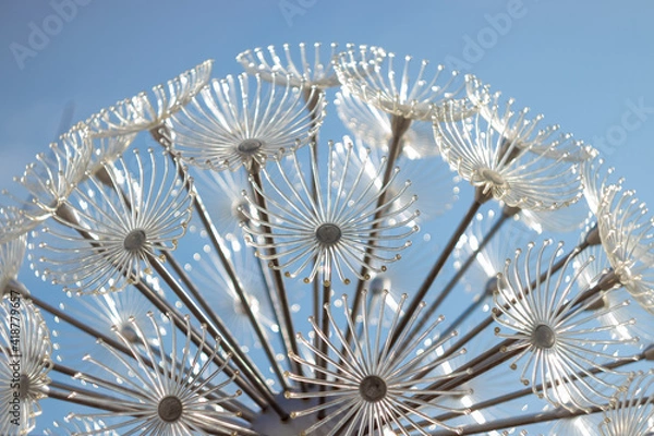 Fototapeta abstract beautiful background of light decaration in form of umbrellas on the blue sky