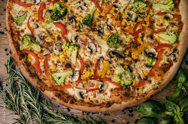 Fototapeta Vegetable pizza with bell peppers and broccoli and mushrooms