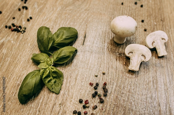 Fototapeta Basil leaves and sliced mushrooms