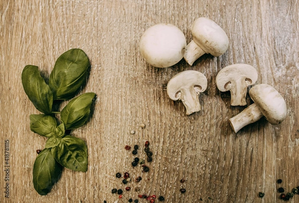 Fototapeta Basil leaves and sliced mushrooms