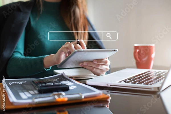 Fototapeta Women are sitting searching for information.