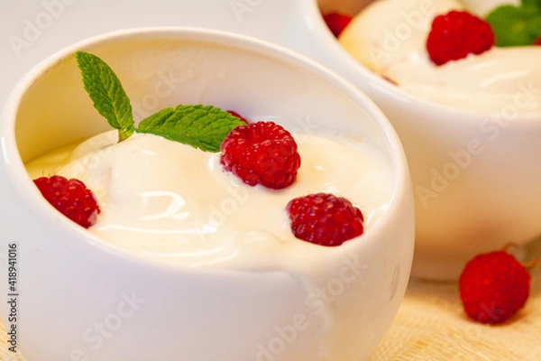 Obraz ice cream with fresh raspberries