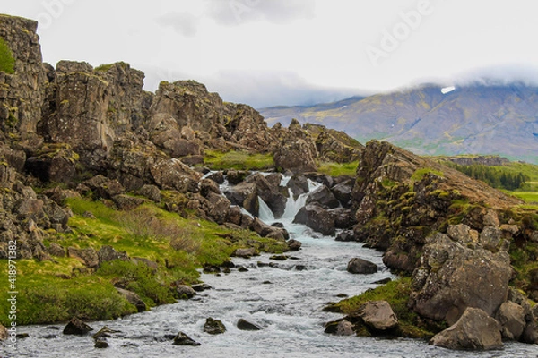 Obraz waterfall between 2 tectonic plates in Iceland