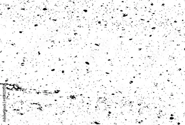 Fototapeta Small uneven spots and particles of debris. Abstract vector texture.  Distressed uneven background. Grunge texture overlay with fine grains isolated on white background. Vector illustration. EPS10.