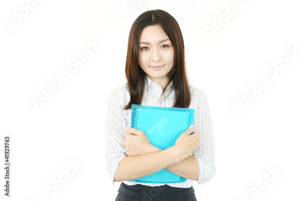 Fototapeta 書類を持ち微笑むＯＬ