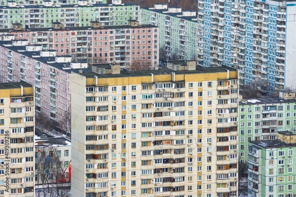 Fototapeta Multi-storey residential buildings made of concrete panels, sleeping areas of the metropolis.