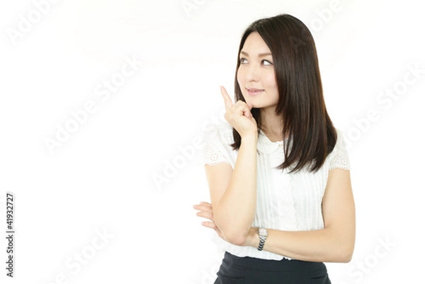 Fototapeta 指差す笑顔のＯＬ