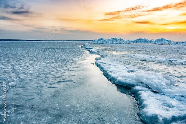 Fototapeta Crack between two layers of ice on the sea