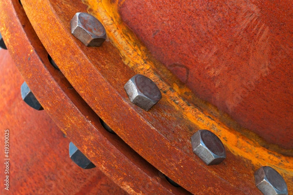 Obraz rusted large metal pipe with bolted connection