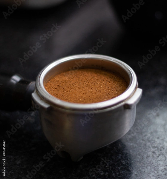 Obraz Grind coffee for espresso