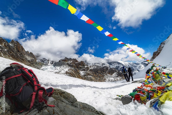 Fototapeta Budda flags in Himalayan mountains at Cho La pass, 5420 meters, Nepal