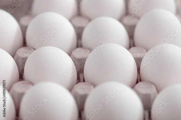 Obraz Fresh white eggs close-up. Soft blur.