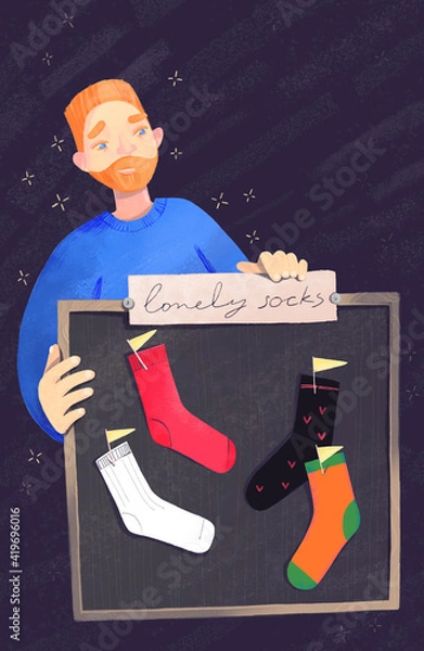 Obraz Redhead man holding message board. Unpaired socks attached to the board. Man looking for his lost socks.