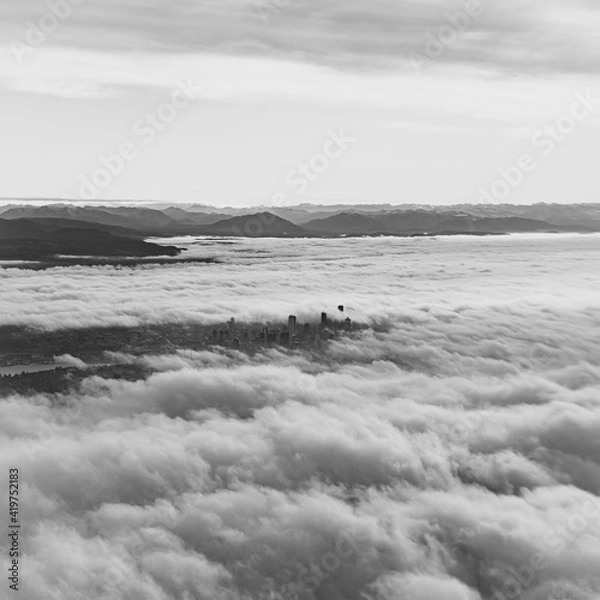 Fototapeta City Through the Clouds