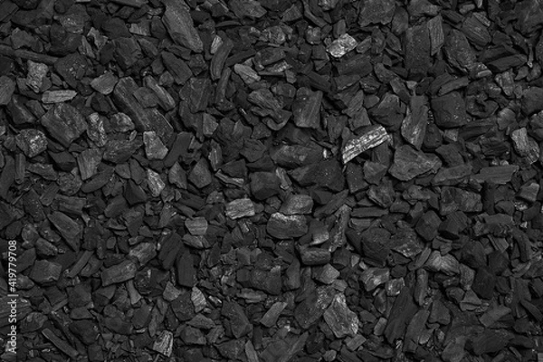 Fototapeta Czarne tło tekstury węgla drzewnego. Pozostałość węgla z płonącego drewna.
