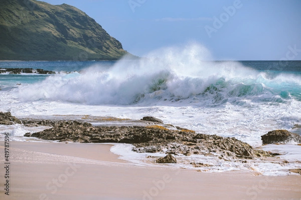 Fototapeta Big waves at Keawaula Beach Yokohama bay, West coast of Oahu Island, Hawaii. reef or beachrocks on the beach. Leeward Coast. Yokohama, Keawaʻula is the last sandy stretch on the west shore.