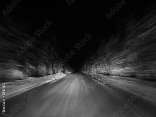 Fototapeta High-speed blur of a winter road.