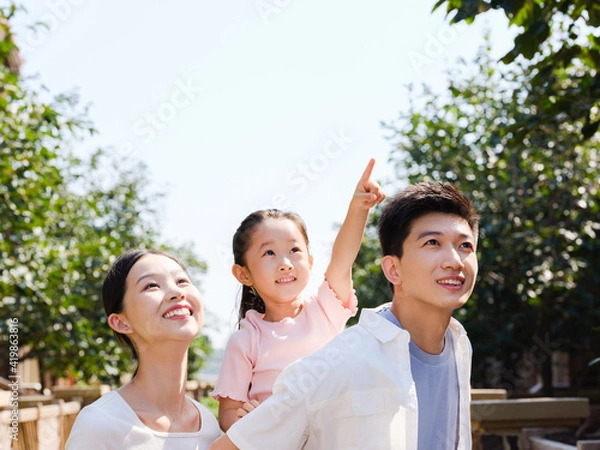 Obraz Happy family of three in the outdoor group photo