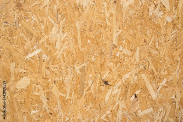 Fototapeta Wooden background, fiberboard or chipboard pattern, pressed wood shavings backdrop, wall made from wood