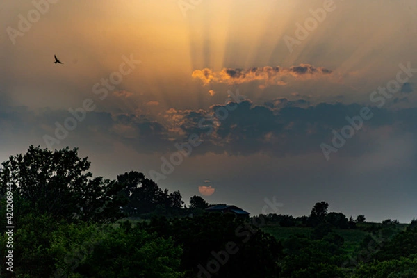 Obraz Rural landscape with clouds at sunset 