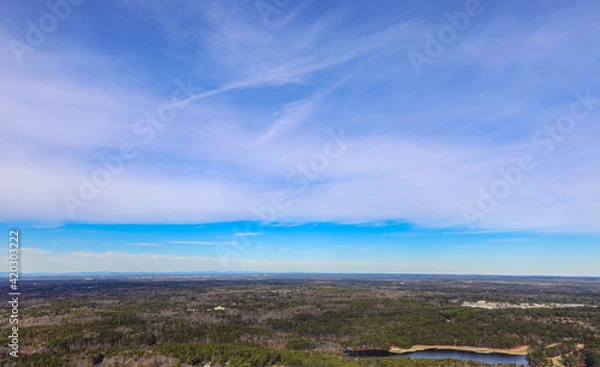 Obraz Blue Sky With Clouds Overlooking City