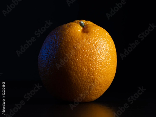 Fototapeta orange on black background