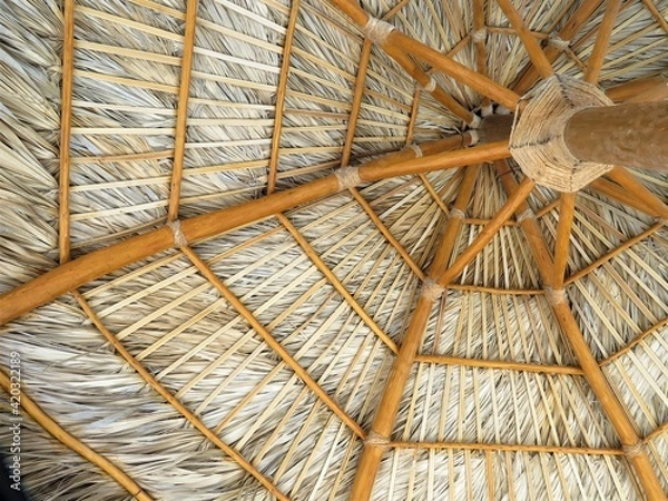 Obraz straw umbrella on the beach