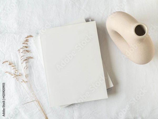 Fototapeta Empty blank white magazine cover mock up, vase and dried grass