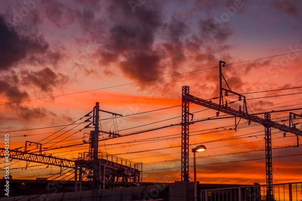 Fototapeta 電柱シルエットと夕焼け