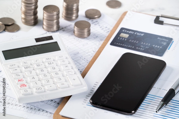 Fototapeta Design concept of annual summary analysis report, paying with electronic device.
