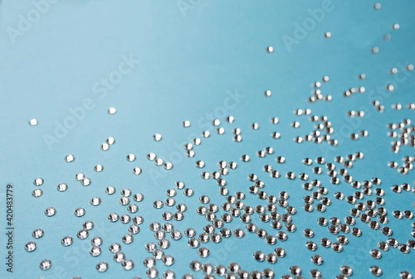 Obraz rhinestones on a blue background, blure. design for text