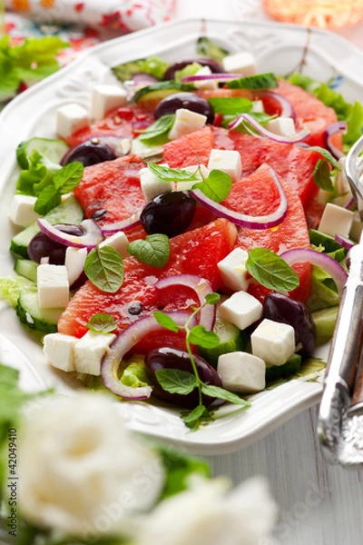Fototapeta Watermelon Salad with Feta,Cucumber,Olive  and Mint