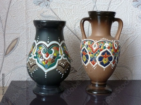 Obraz A jug and a vase painted with a multi-colored complex pattern