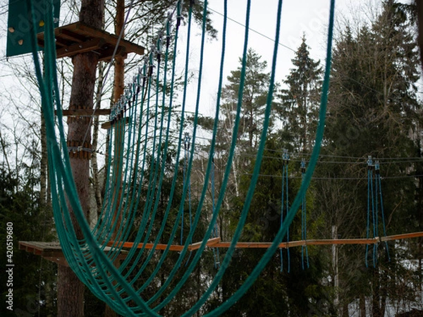 Obraz rope town. stretched ropes between trees with insurance.