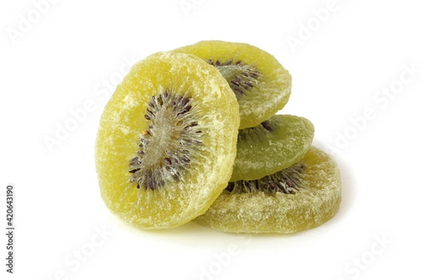 Fototapeta Four tasty slices dried kiwi isolated on white