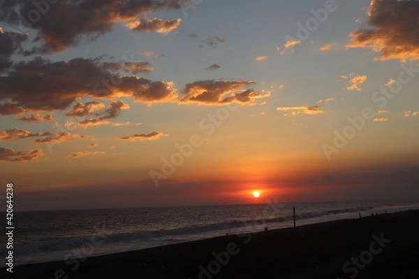 Obraz sunset on the beach with clouds