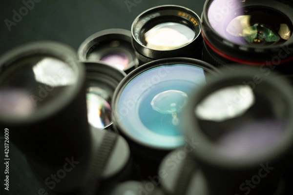 Fototapeta 
glare on lenses with black background