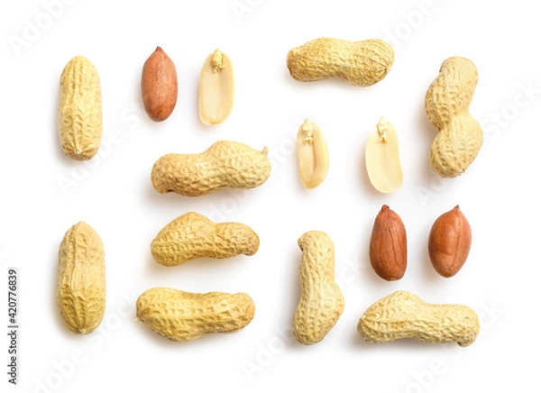 Obraz Unpeeled and peeled peanuts isolated on white