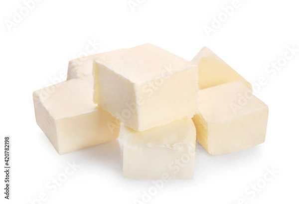 Fototapeta Pieces of fresh butter isolated on white background.