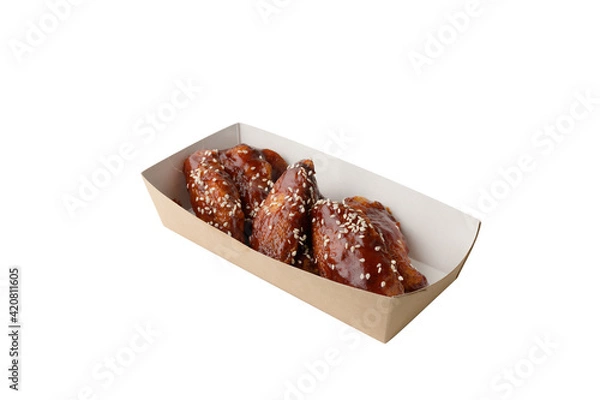 Obraz appetizing fried portion of chicken BBQ in paper box on white isolated background