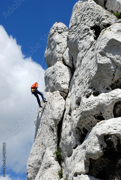 Fototapeta climbing man