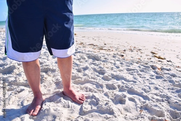 Obraz Man standing alone on the beach